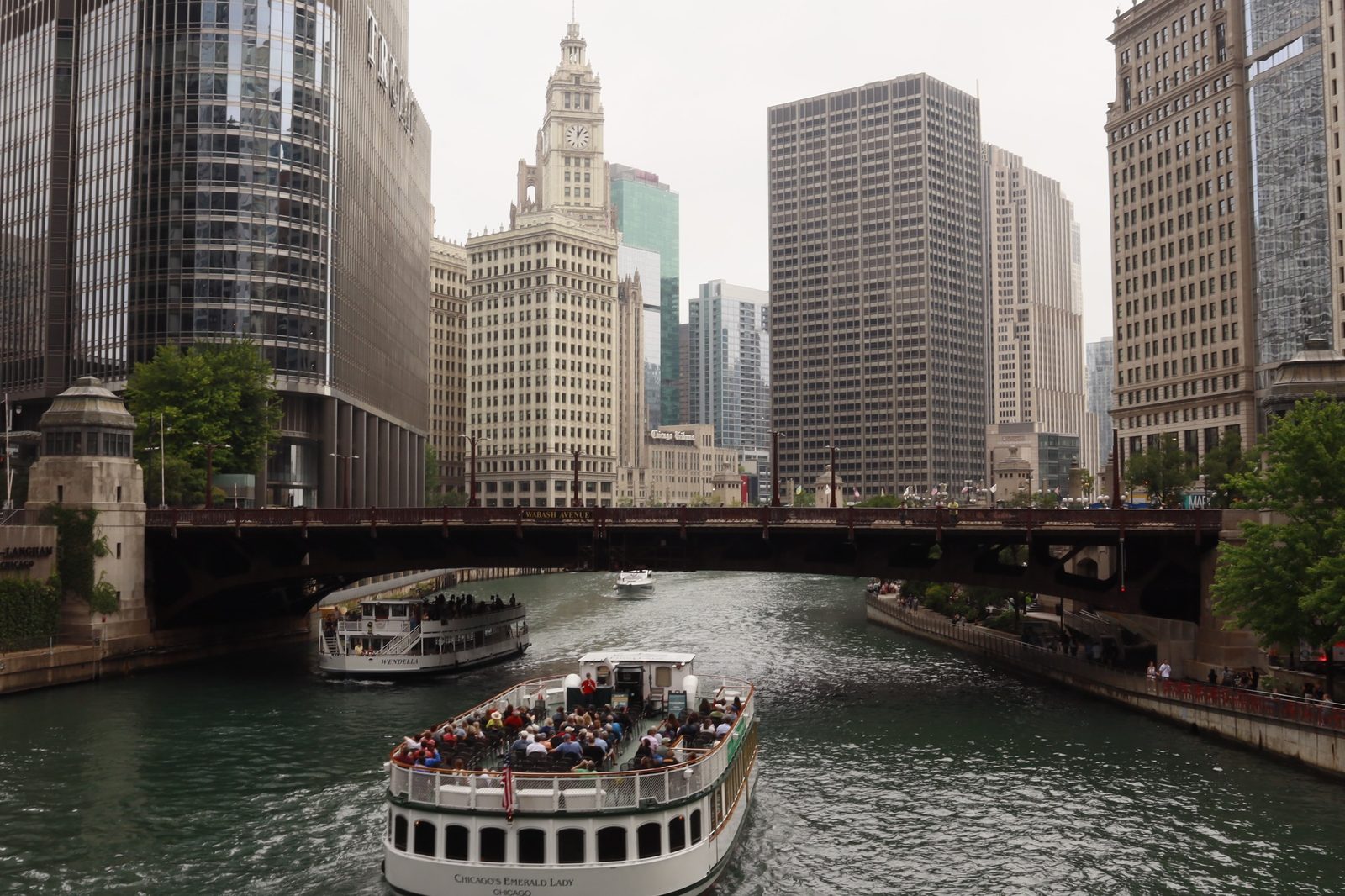 Chicago River with boat and skyline